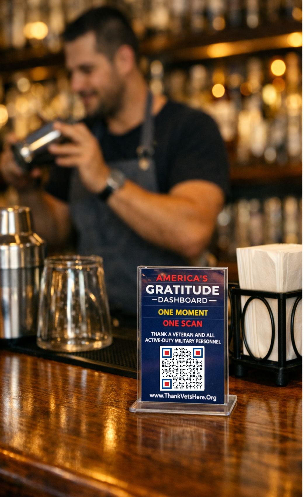 America's Gratitude Dashboard QR code displayed on a bar counter