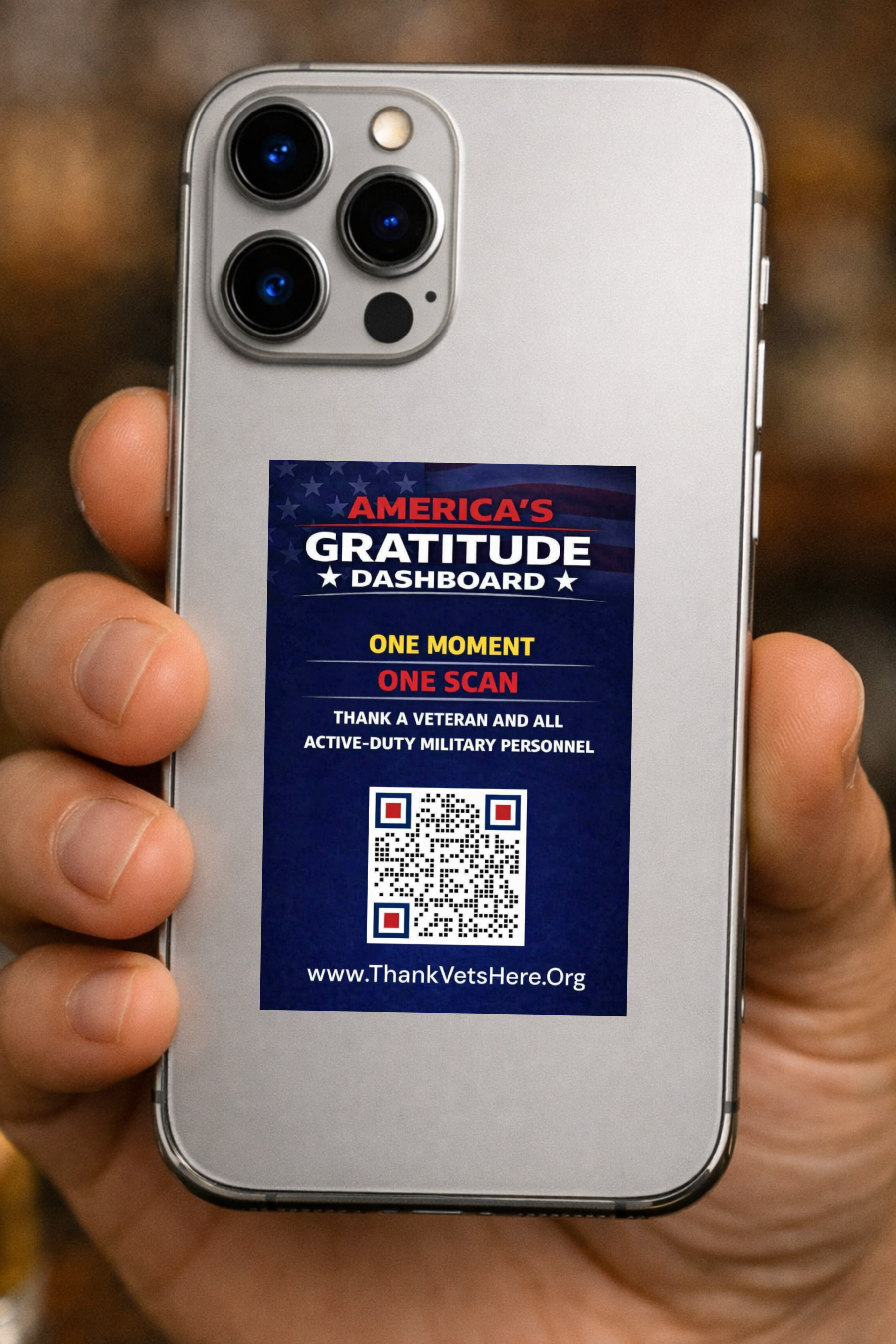 America's Gratitude Dashboard QR code displayed on a phone
